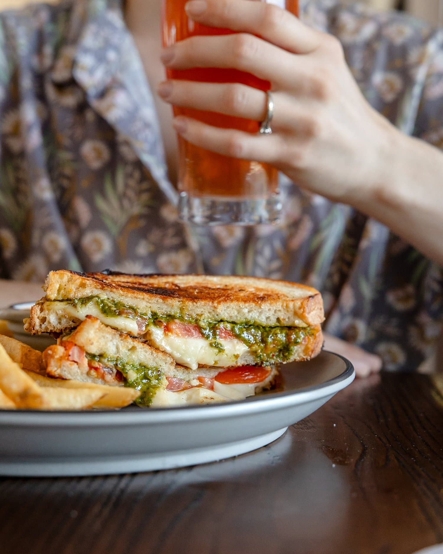 A sandwich and beer served at Hidden Wit