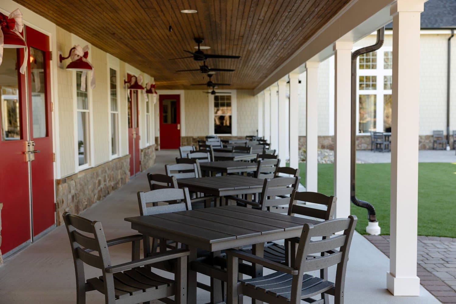 Tables arranged along the covered porch